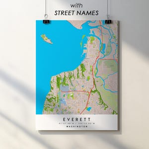 May include: A map of Everett, Washington, with street names, is displayed on a white background. The map features a blue water area, green land areas, and red roads. The text "EVERETT" and "WASHINGTON" are at the bottom.