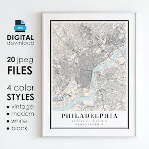May include: A printable map of Philadelphia, Pennsylvania in a black frame. The map shows the city streets and waterways in black and white with a light blue accent color. The text "PHILADELPHIA" is printed in black at the bottom of the map with the coordinates "40°00'34"N / 75°10'00"W" and "PENNSYLVANIA" printed below the coordinates.