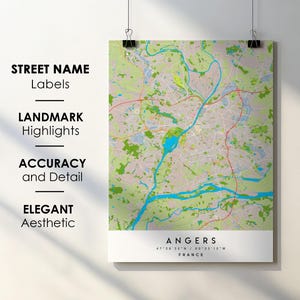 May include: A detailed map of Angers, France, with street names and landmark highlights. The map uses a light green and beige colour scheme, with blue water features and red roads. The text "ANGERS" and coordinates are displayed at the bottom.