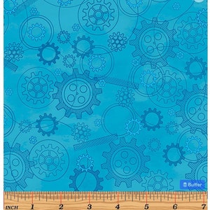 May include: Medium blue fabric with a repeating gear design in various sizes. The gears are outlined in a darker blue, set against a watercolor-style background. The text "Construction Plans Medium Blue" is at the bottom.