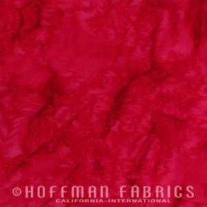 May include: A close-up of a bright red fabric with a marbled pattern. The fabric has a soft, flowing texture and a subtle sheen.