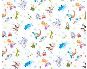 On-the-Go Tossed Animals Quilting Cotton features adorable animals on bikes, scooters, & rocket ships. Perfect for baby shower, baby quilt.