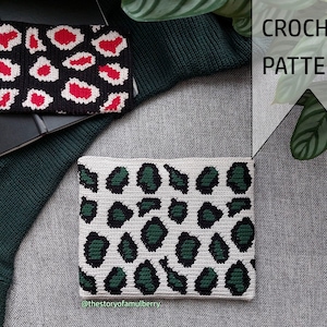 May include: Two crochet items with animal print patterns. One is black with red and white spots, and the other is white with green and black spots. The image also includes the text "CROCHET PATTERN".