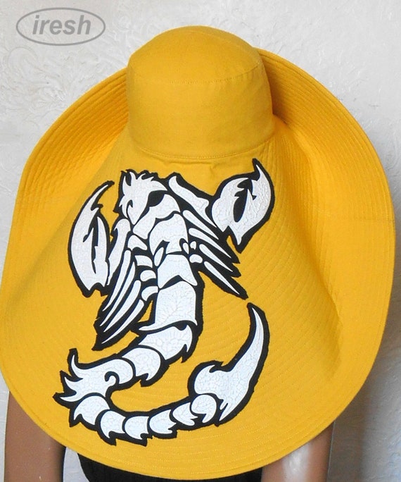 wide brimmed yellow hat