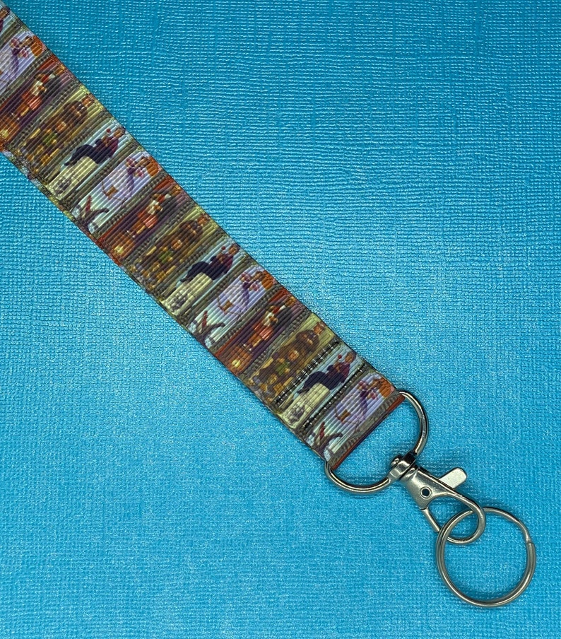 Disneyland Inspired Haunted Mansion Stretching Room Portraits Lined Lanyard with Silver Swivel Clasp