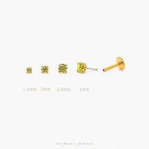 May include: Gold-coloured stud earrings with yellow-green gemstones, in sizes 1.5mm, 2mm, 2.5mm, and 3mm. One earring is shown from the side. The brand name "SHEMISLI JEWELS" is at the bottom of the image.