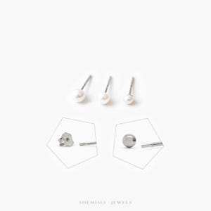 May include: Three pairs of pearl stud earrings in varying sizes are displayed against a white background. Two close-up images show the earring backs. The earrings are from Shemisli Jewels.