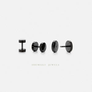 May include: Four black dumbbell-style earrings displayed against a white backdrop. The earrings are shown in different stages of assembly, highlighting the design and components. The text "SHEMISLI JEWELS" is printed below the earrings.