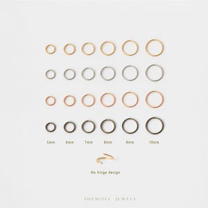 Peut inclure: Une sélection de créoles en or, argent et or rose, disposées en rangées. Les tailles varient de 5 mm à 10 mm, avec une boucle d'oreille en spirale en bas. Le texte "No hinge design" est visible.