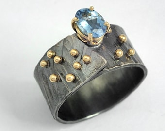 A wide band ring of oxidized silver, studded gold granules and a gem,Aquamarine ring, Gold silver ring.