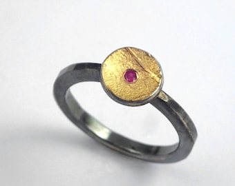 Circle ring made of gold and oxidized silver  with  a genuine ruby, Geometric ring, Ruby ring with rough surface, Gold and silver ring