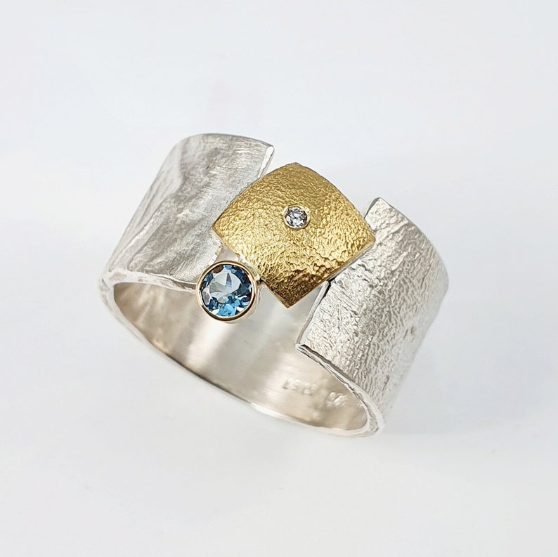 Modern wide band ring made of 22K gold and 925 silver with a small diamond and a peridot stone, Hammered ring, Gift for her, Geometric ring. Aquamarine