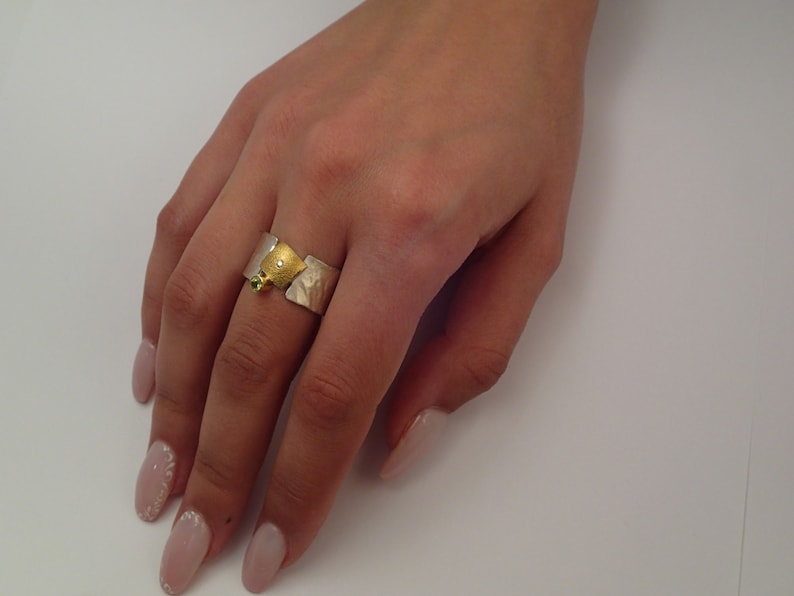 Modern wide band ring made of 22K gold and 925 silver with a small diamond and a peridot stone, Hammered ring, Gift for her, Geometric ring. image 2