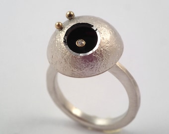 A crater of the moon. A modern silver and gold ring with a small diamond and two studded gold granules, Girlfriend gift, Gift for Her.