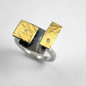 The Rubik's cube. An artistic geometric gold and silver ring with diamonds and hammered band for nights out. image 2