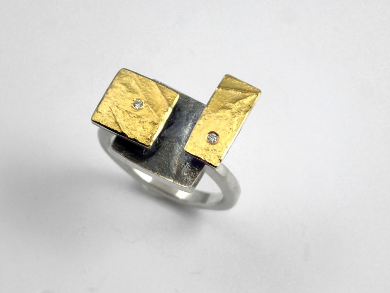 The Rubik's cube. An artistic geometric gold and silver ring with diamonds and hammered band for nights out. image 2