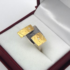 The Rubik's cube. An artistic geometric gold and silver ring with diamonds and hammered band for nights out. image 4
