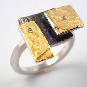 The Rubik's cube. An artistic geometric gold and silver ring with diamonds and hammered band for nights out. image 1