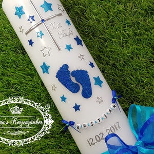 Christening candle in blue with baby feet