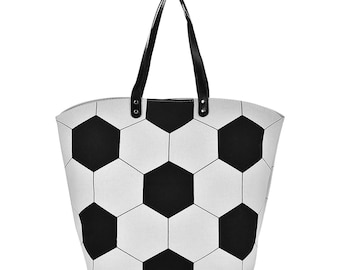 May include: White tote bag with a black and white soccer ball pattern. The bag has black handles and a black top trim. The bag is designed to resemble a soccer ball.