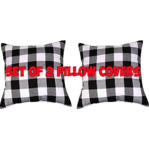 May include: Set of two black and white buffalo plaid pillow covers.