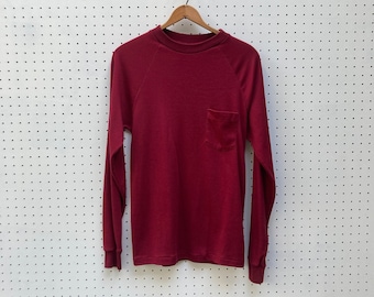 size M - 1970s long sleeved raglan pocket tee by CAMPUS