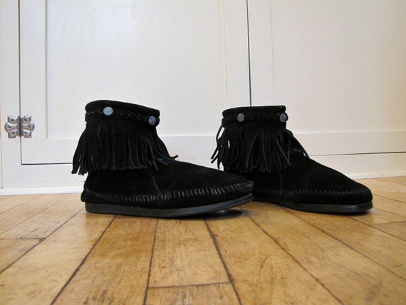 black fringe moccasin boots