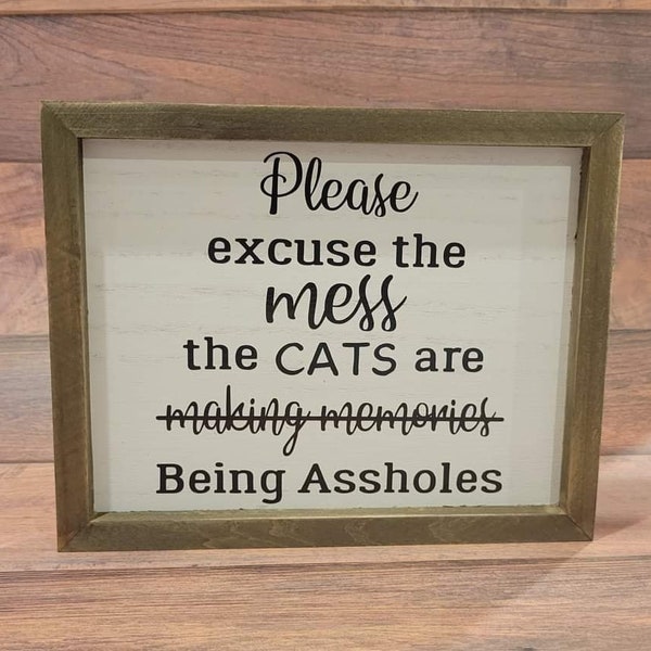 Please excuse the mess, the cats, wood sign