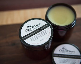 Coups de soleil, dommages causés par le soleil, crème cicatrisante à l'aloe vera biologique avec infusion d'huile à base de plantes.   Erythème fessier, crème pour l'eczéma, psoriasis, peau sèche et gercée.
