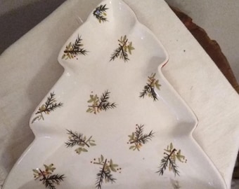 Mid century ceramic treats or snack dish, 11 1/2 x 12 1/2, with holly leaves, berries, pine sprigs on a white background, red underside