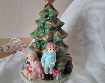 Vintage light up Christmas tree, 7 in., with girl and boy, train and presents, bisque porcelain, cold painted, marked Made in Taiwan, R.O.C.