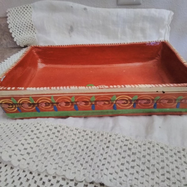 Vintage Mexican pottery rectangular dish, 15 x 8 x 2 1/2, pretty, green, blue, white, yellow, on brick red background, nice primitive piece