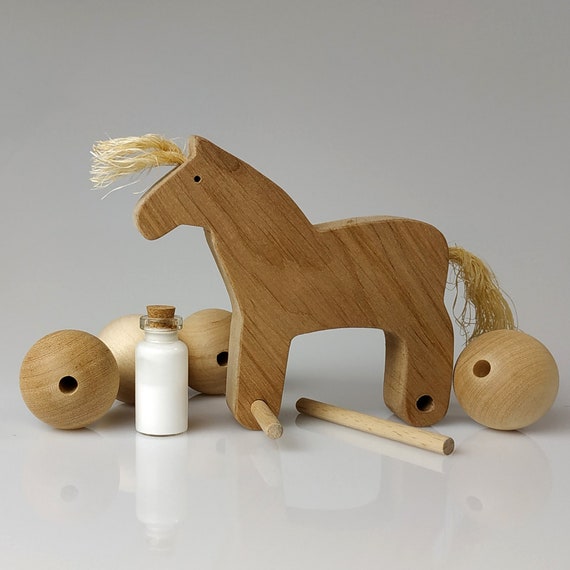 wooden horse on wheels