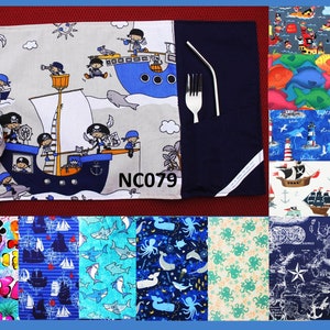 May include: A set of 10 fabric placemats featuring various nautical themes. The placemats are made of cotton and have a variety of colours, including blue, green, white, and red. The placemats are perfect for adding a touch of nautical style to your dining table.