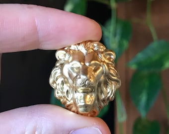 Brass lion head suspend.it screw and nail cover