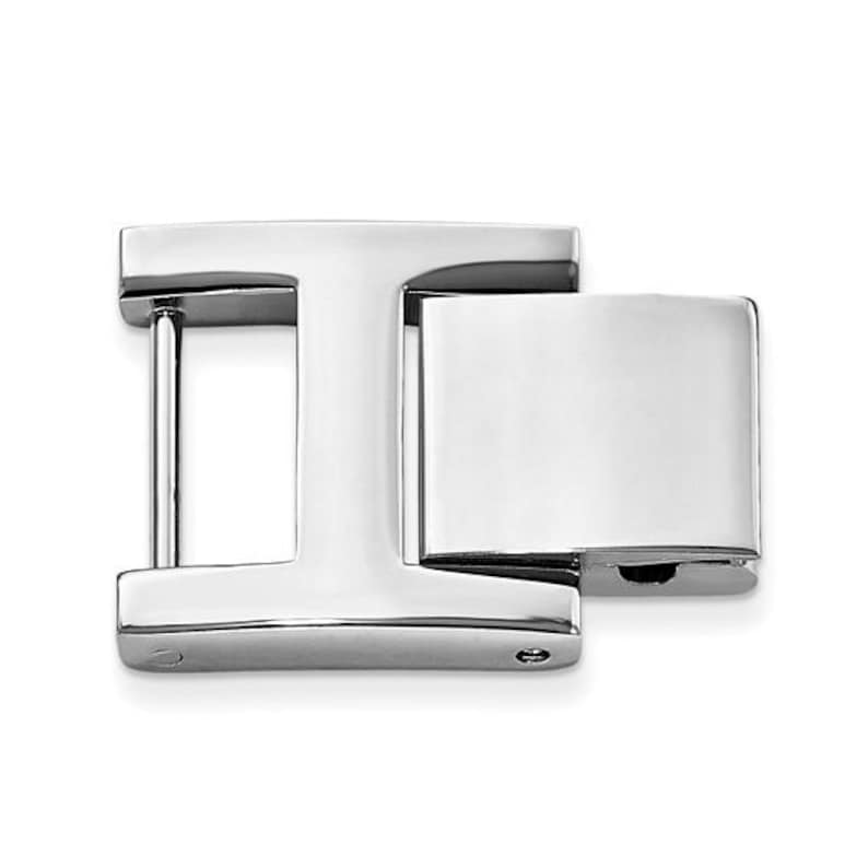 May include: A shiny, silver-colored metal clasp with a rectangular shape. The clasp has an "I" shape with a rectangular piece attached to the right side. The clasp is designed to connect two parts together.
