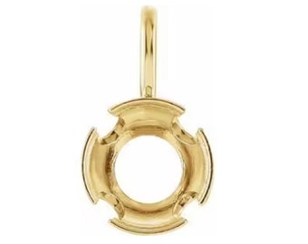 May include: Gold pendant setting with a round bezel for a gemstone. The pendant has a bail for attaching to a chain.