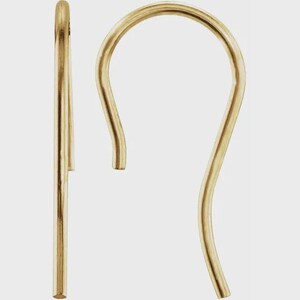 May include: A pair of gold-toned earring hooks featuring a smooth, curved wire design. One hook is displayed in a straight vertical orientation, while the other is shown in a rounded, open loop shape, both showcasing a polished metallic finish.