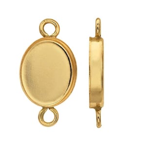May include: Two gold-colored oval bezel connectors with loops at the top and bottom for jewelry making. One connector is shown face-on, the other from the side, displaying the depth of the bezel.