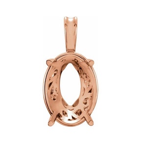 May include: A rose gold pendant setting with a delicate, intricate design. The setting is oval shaped and has four prongs to hold a gemstone.