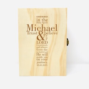May include: A wooden box with a brown inscription that reads "CONFIRMED in the Holy Spirit Michael Trust & believe in the LORD Unconditionally and always. Every day be thankful and He will guide you on your journey. 05.05.2019"