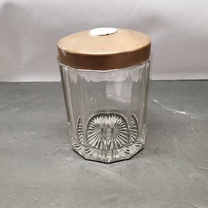 nice heavy glass Tobacco jar with cameo button on top