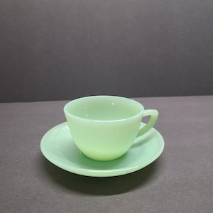Fire king Jade-ite Jane Ray demitasse cup and saucer.