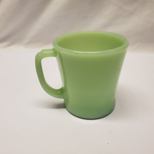 Jade-ite green 8 oz. fire king coffee mug.