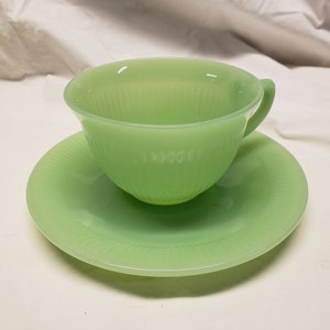 Fireking Jade-ite Jane ray Tea cup and saucer.These have the Anchor logo. Saucers have the Anchor logo on rayed bottom see pic.