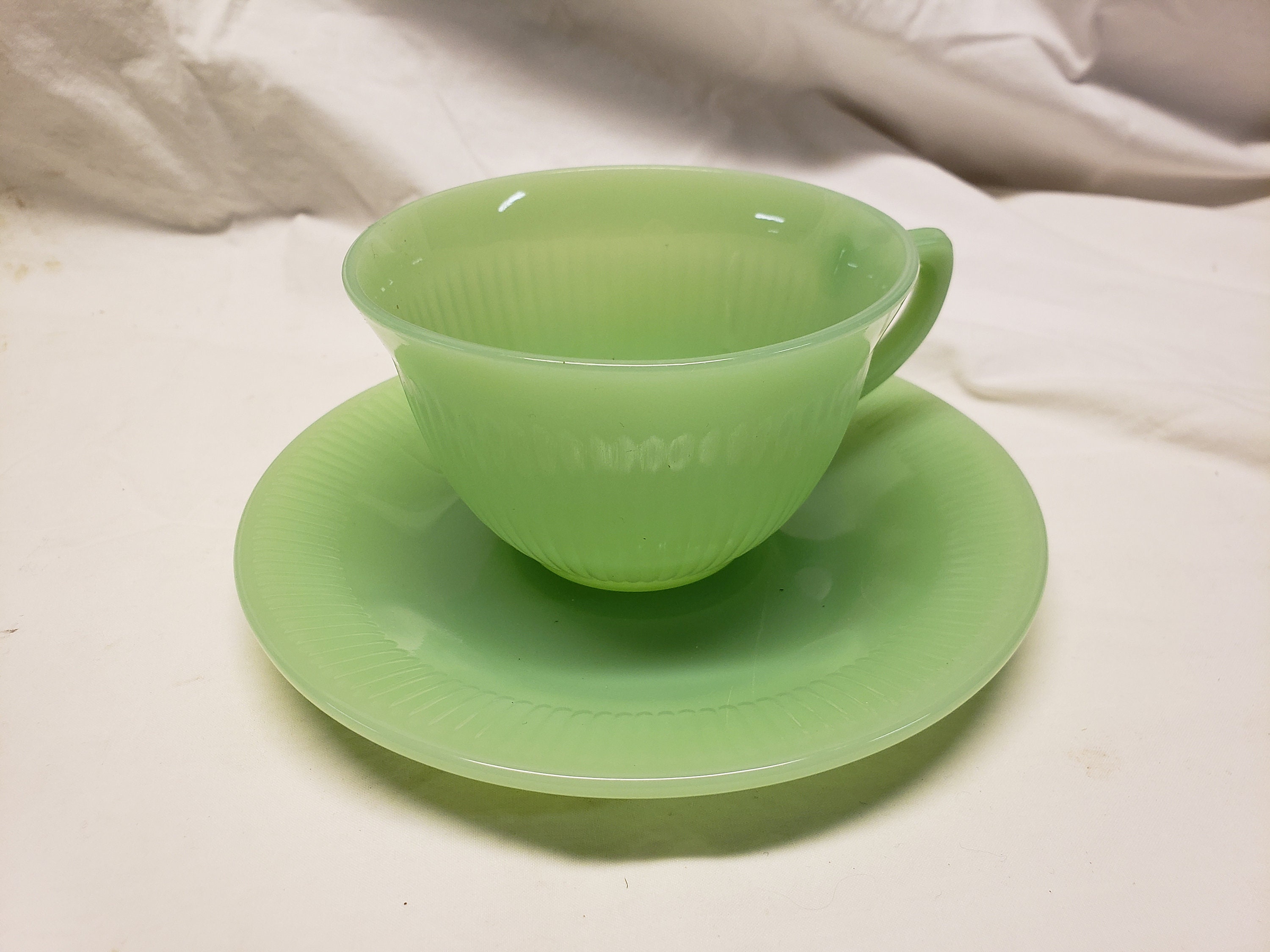 Fire king tea cup and best sale saucer