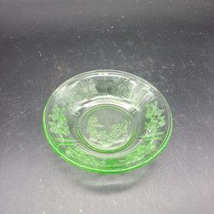 Green Sharon 5&quot; berry bowl 1.25&quot; deep. This bowl is uranium glass.