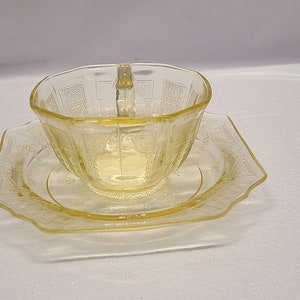 Yellow Princess Depression glass tea cup and saucer