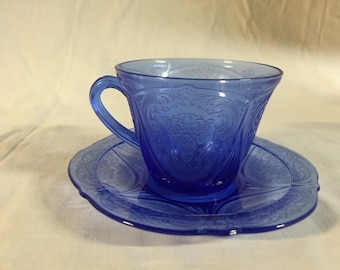 Blue royal lace depression Cup and saucer. Saucers have a little inner rim flea bites.
