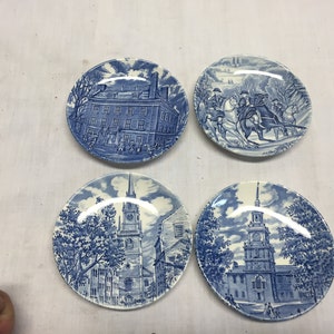 set of 4 Staffordshire Liberty blue Coasters/butter pats. They measure 4 1/8&quot;